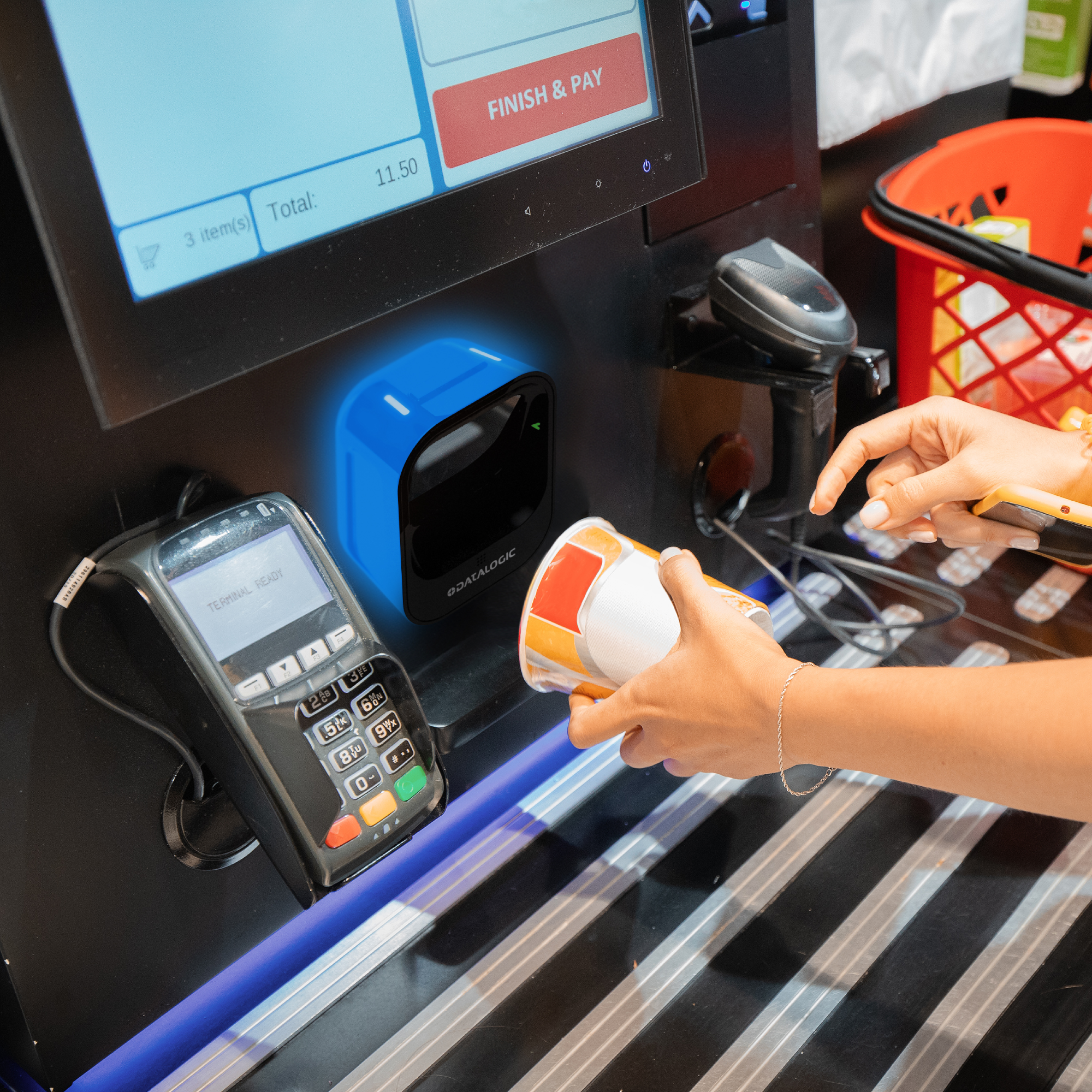Retail employee using a barcode scanner at checkout