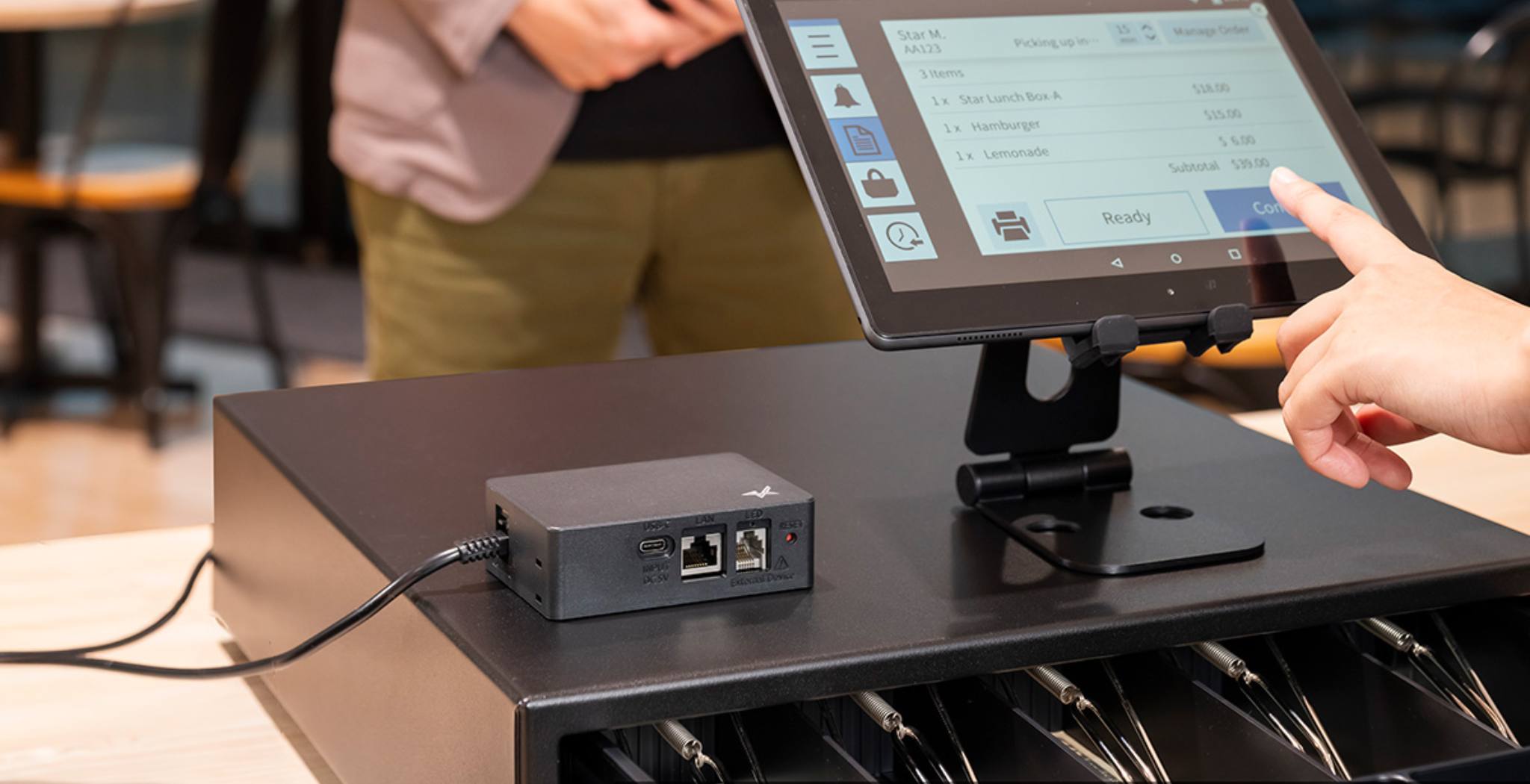 Point of sale cash drawer for a retail checkout